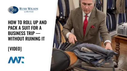 How to Roll Up and Pack a Suit for a Business Trip — Without Ruining It